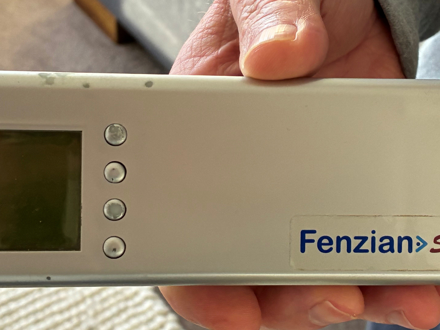Shaun holding the Fenzian device